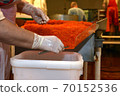 Preparing salmon caviar in the fishing processing plant 70152536