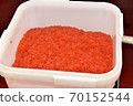 Plastic pail full of salmon caviar 70152544