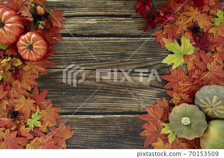 Top view Autumn leaves and pumpkins wooden Top view Autumn leaves and pumpkins wooden 70153509