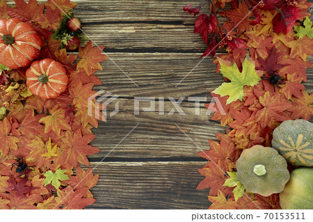 Top view Autumn leaves and pumpkins wooden 70153511