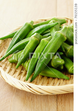 Okra in a bamboo basket Okra in a bamboo basket 70155139
