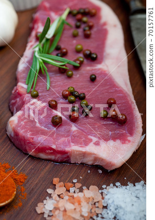 raw uncooked  ribeye beef steak butcher selection 70157761