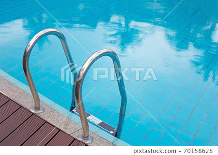 Outdoor swimming pool with stair 70158628