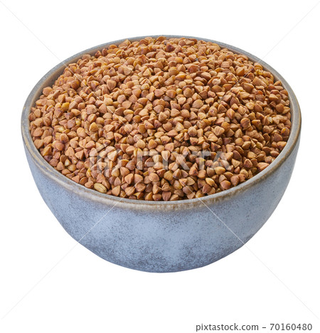 raw buckwheat in bowl with clipping path 70160480
