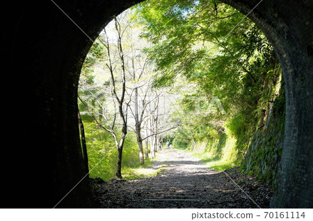 Abandoned railway track seen from Nagaoyama No. 2 tunnel (near the exit, early autumn) on the Takedao abandoned railway line in Takarazuka City, Hyogo Prefecture 70161114