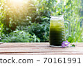 Centella asiatica iced drink water on wooden table, Healthy drink 70161991