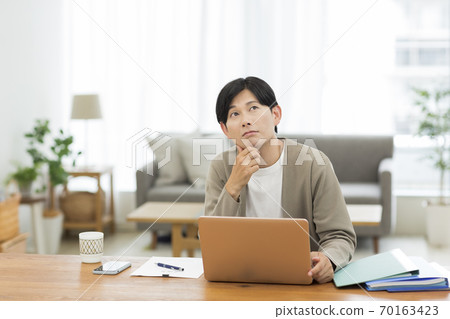 Men working from home Remote work 70163423