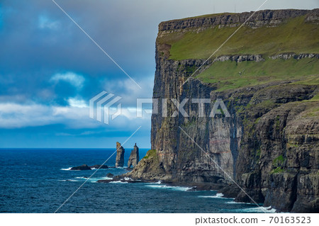 Risin og Kellingin of faroe islands in the horizon 70163523