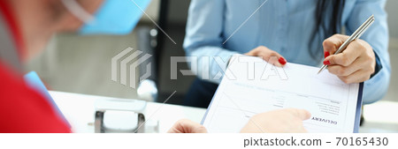 Courier wearing protective medical mask delivered package Courier wearing protective medical mask delivered package 70165430