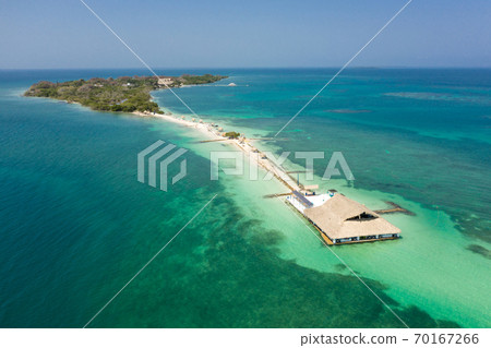 Tropical paradise white sand beach and relaxation zone on the island Cartagena Colombia aerial view. Tropical paradise white sand beach and relaxation zone on the island Cartagena Colombia aerial view. 70167266