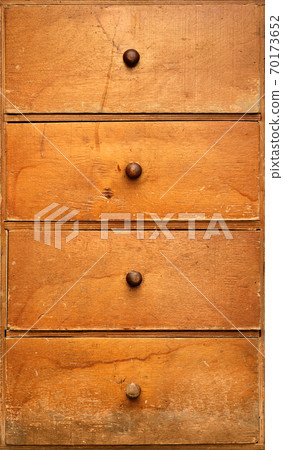 Old wooden cabinet with drawers Old wooden cabinet with drawers 70173652