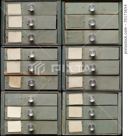Old wooden cabinet with drawers Old wooden cabinet with drawers 70173654