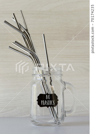 reusable drinking straws and text no plastics 70174235