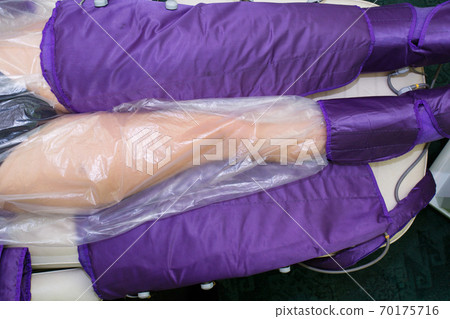 Pressotherapy for feet in the spa salon. Pressotherapy for feet in the spa salon. 70175716