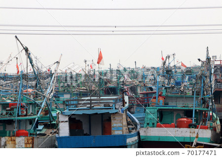More than hundred Indonesia fishing boat docked at the pier. 70177471