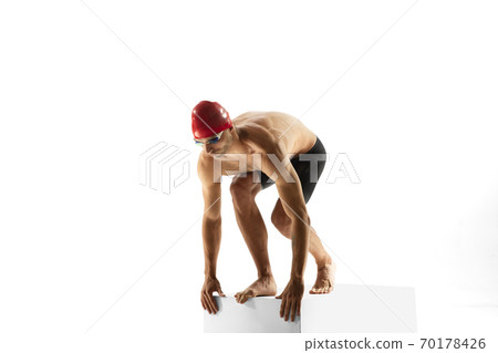 Caucasian professional sportsman, swimmer training isolated on white studio background 70178426