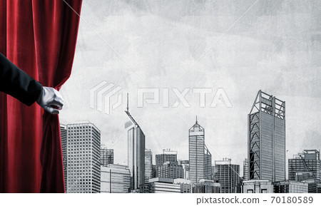 Modern drawn cityscape behind drapery curtain and hand opening it Modern drawn cityscape behind drapery curtain and hand opening it 70180589