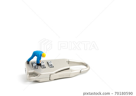 Miniature people worker : Teamwork helps to unlock password on the keys. Miniature people worker : Teamwork helps to unlock password on the keys. 70180590