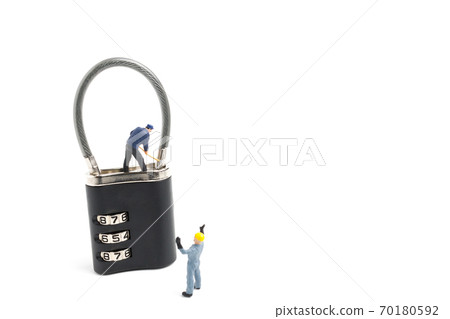Miniature people worker  : Teamwork helps to unlock password on the keys.  70180592