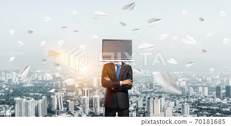 Businessman with laptop instead of head. Businessman with laptop instead of head. 70181685