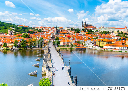 Prague panorama with Prague Castle, and Charles Bridge over Vltava River. View from Old Town Bridge Tower, Czech Republic 70182173