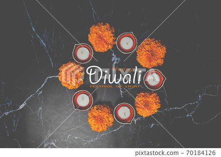 Happy Diwali day. Colorful traditional oil lamp diya on dark background. Happy Diwali day. Colorful traditional oil lamp diya on dark background. 70184126
