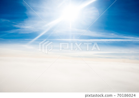 Cloudscape view with bright sun Cloudscape view with bright sun 70186024