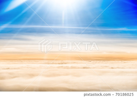 Beautiful airview with blue sky, white clouds and sunrays 70186025