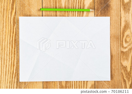 Artist workplace with sheet of paper Artist workplace with sheet of paper 70186211