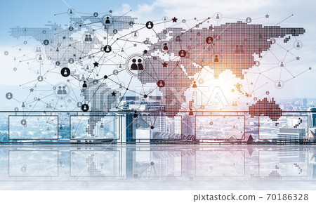 Concept of global communication and networking with world map over cityscape Concept of global communication and networking with world map over cityscape 70186328