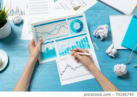 Corporate consultant analyze financial diagram 70186740