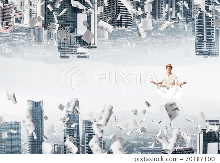 Young man keeping mind conscious. Young man keeping mind conscious. 70187100