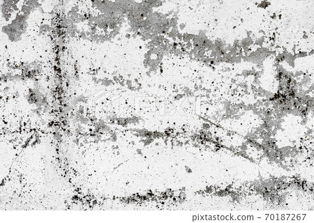 Texture of a concrete wall with cracks and scratches which can be used as a background Texture of a concrete wall with cracks and scratches which can be used as a background 70187267