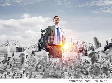 Successful confident businessman in suit. Successful confident businessman in suit. 70187368