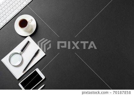 Top view of modern workplace with smartphone 70187858