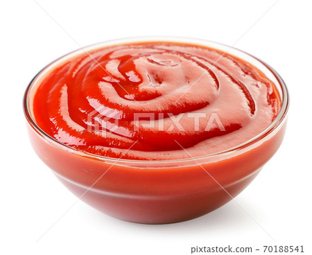 Ketchup in a glass plate on a white background 70188541