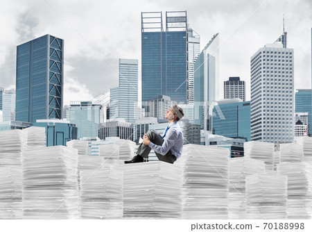 Businessman dreaming about future business. Businessman dreaming about future business. 70188998