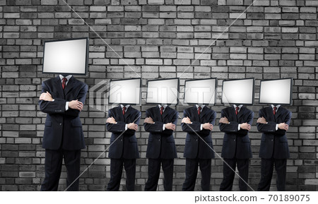Businessmen with TV instead of head. Businessmen with TV instead of head. 70189075
