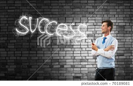 Conceptual image of young businessman. Conceptual image of young businessman. 70189081