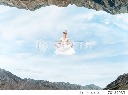 Young woman keeping mind conscious. 70189085