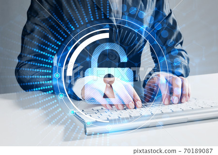 Internet security concept with woman typing password on keyboard 70189087