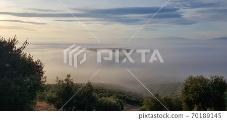 Andalusia landscapes. Fog in rural and agricultural. Mountains in the fog Andalusia landscapes. Fog in rural and agricultural. Mountains in the fog 70189145
