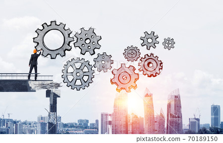 Businessman drawing teamwork conceptual scheme. Businessman drawing teamwork conceptual scheme. 70189150