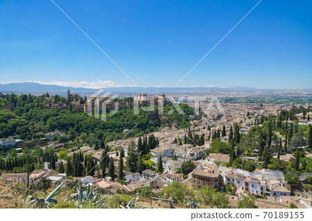 Panoramic view of Granada city with Alhambra palace from Albaicin of Granada, Spain. Panoramic view of Granada city with Alhambra palace from Albaicin of Granada, Spain. 70189155