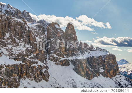 Rock formation called sella towers in the dolomites in south tyrol in winter 70189644