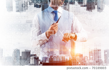 Conceptual image of successful businessman. Conceptual image of successful businessman. 70189803