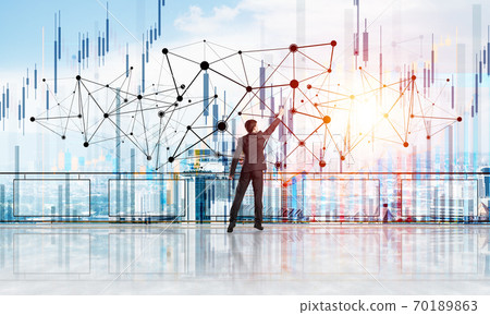 Rear view of businessman drawing social connection and networking concept Rear view of businessman drawing social connection and networking concept 70189863