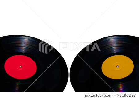 Two 33 rpm vinyl records on white backgrounds 70190288