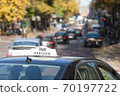 the taxi car on the street of Paris 70197722