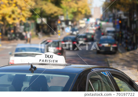 the taxi car on the street of Paris 70197722